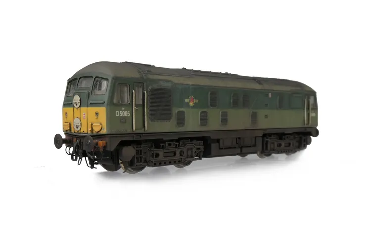 D5005 with detailed buffer beam at one end and semi detailed at coupling end, driver fitted, renumbered, headcode discs slimmed down and extra catches added, etched workplates, etched 3D roof grill with fan and speedo cable added..