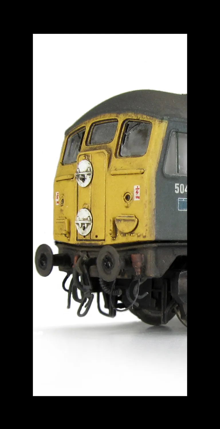 D5041 Resprayed nose ends into full yellow and white bodyside stripe taken off with detailed buffer beam at one end, driver fitted, renumbered, etched work plates, lime stain down body and slimmed down headcode discs.