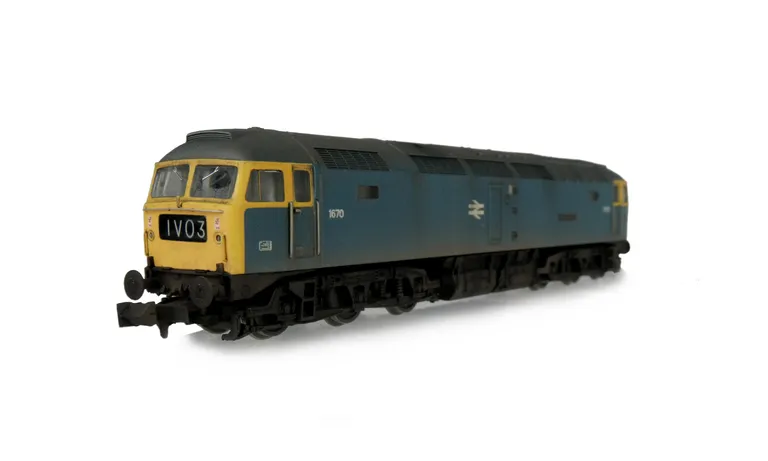 D1670 Renumbered with semi detailed buffer beam at both ends, etched nameplates, moulded nose handrails replaced with wire, body lowered, etched work plates, headcodes changed, nose catch and etched 3D fan and grill fitted.