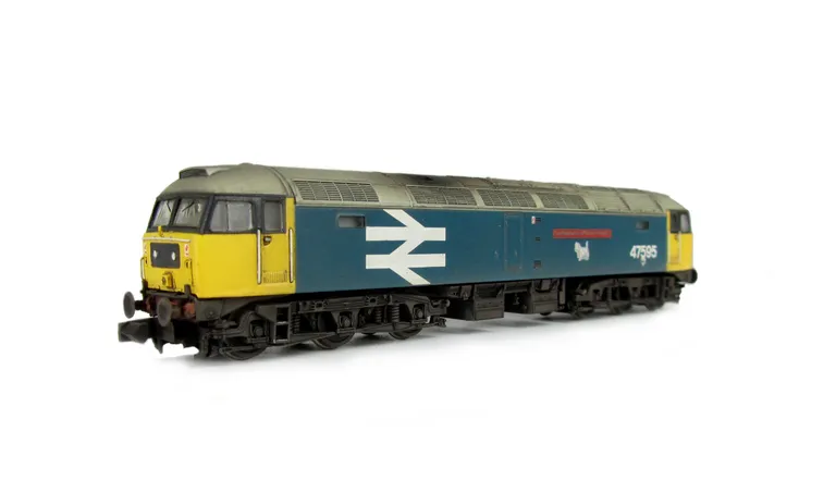 47595 on lowered chassis. Details include: renumbered, black window edging extended as per prototype, semi detailed buffer beam at both ends, moulded nose handrails replaced with wire including pommels and nose catch added.