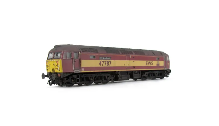 47787 showing a full respray into EWS livery. Base model has been converted to a cutaway buffer beam example with etched kick plates and modified battery box. Other details include: detailed buffer beam at one end and semi detailed at coupling end, driver