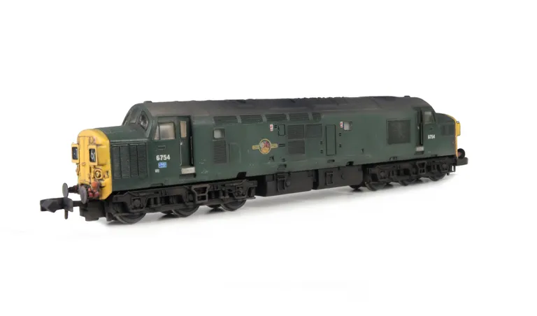 D6754 Details include: respray of nose end to yellow, semi detailed buffer beam at both ends, nose end etched headcode surrounds, change of headcode, moulded roof grill replaced with 5 part etched fan and grill, bogie mod to reduce gap between body and bo
