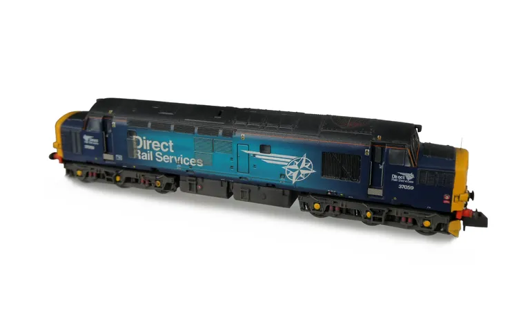 37059 with full respray into DRS fade livery. Modifications include; nose end modified with wipac lighting and cab light. Other Details include bogie modification to reduce gap between body and bogies, cab bulkheads, moulded roof grill replaced with 3D et