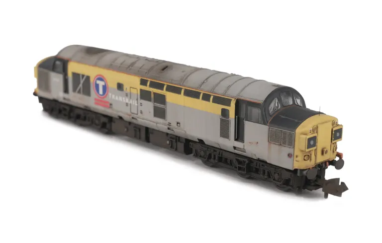 37351 shown in a dilapidated state with modification of boiler access panel and steps plated over and semi respray of  bands to correct faded shades. Other details include bogie modification to reduce gap between body and bogies, relivery to Transrail, et