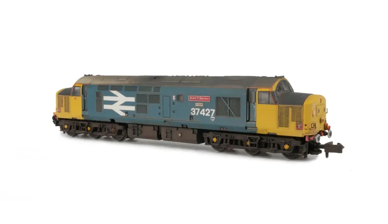 37427 with livery modifications including dragon and cantrail moved. Details include bogie modification to reduce gap between body and bogies, moulded roof grill replaced with 3D etched fan and grill, nose catches, etched nameplates, speedo cable and semi