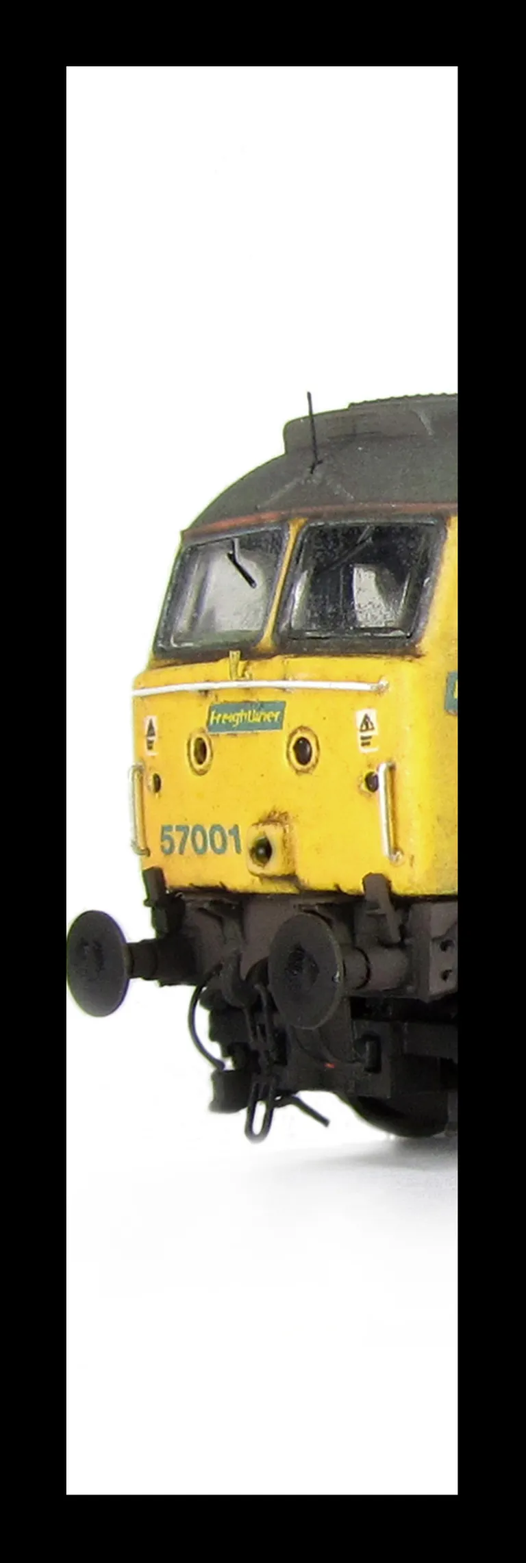57001 converted to a flush fronted headcode at one end with moulded roof grill replaced with etched fan and grill, renumbered, driver, moulded front handrails replaced with wire including pommels, body lowered, detailed battery box, etched nameplates, det