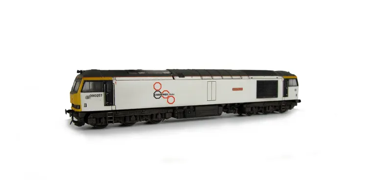 60006 Full respray into Fantasy livery. Details include: detailed buffer beam at one end and semi detailed at coupling end, specially commissioned etched plates, renumbered, body lowered and driver fitted.