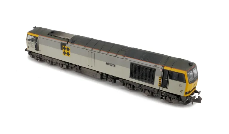 60004 Details include: renumbered, semi detailed buffer beam at both ends including snowploughs fitted with notch for couplers, driver fitted, etched plates and body lowered.