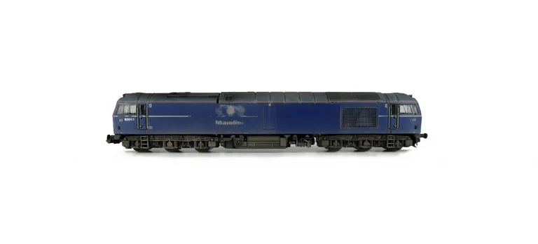 60011 with faded paintwork along with distressed livery and patch paintwork of the blue as per the prototype, detailed buffer beam at one end and semi detailed at coupling end, renumbered, distressed silver window frames and body lowered.