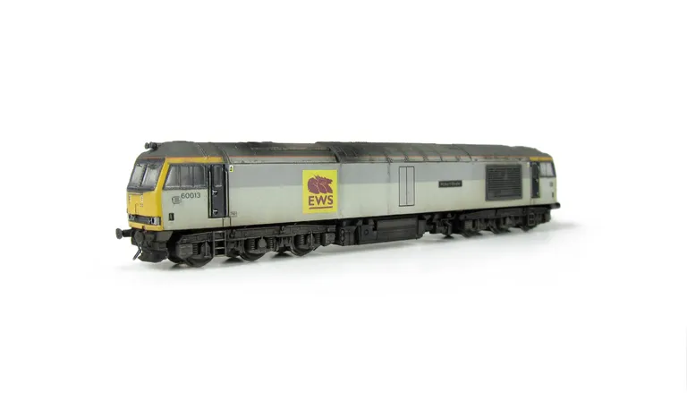 60013  Faded paintwork with special effect on one engine door showing a different shade of grey, grey light surrounds, different coloured nameplates, renumbered, detailed buffer beam at one end and semi detailed at coupling end, body lowered. Relivery wit