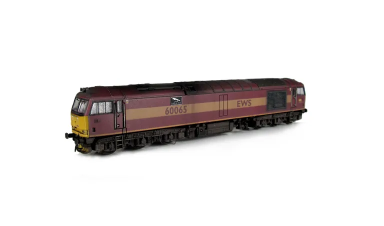 60065 with faded paintwork, detailed buffer beam at one end and semi detailed at coupling end, yellow snowploughs, renumbered, etched plates, driver fitted and body lowered.