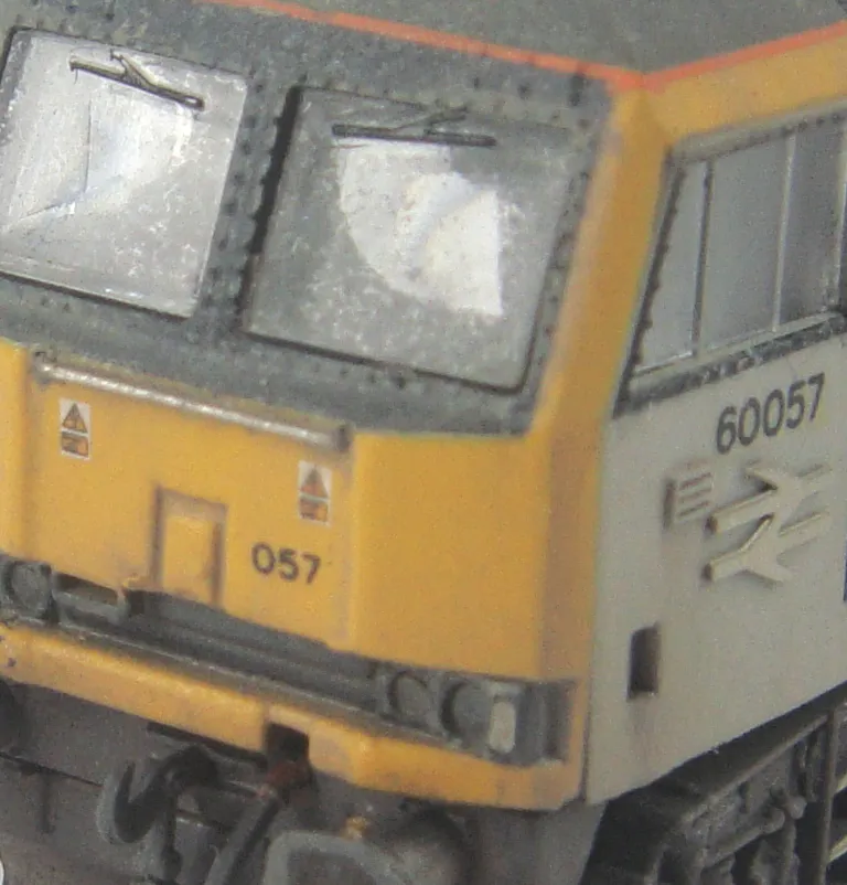 Clse up of class 60 cab showing the area wiped clean by wiper blades