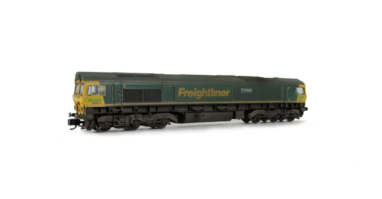 66612 with faded paintwork. Moulded front handrails replaced with wire versions including pommels, springs added to bogie frames, moulded steps below doors replaced with wire versions, moulded roof grill replaced with etched version including pipes under 