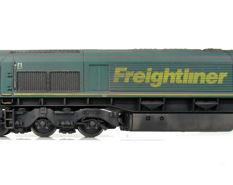 66538 converted from a dummy shell to a powered unit, renumbered, detailed buffer beam at one end and front end handrails replaced with wire and pommels added.