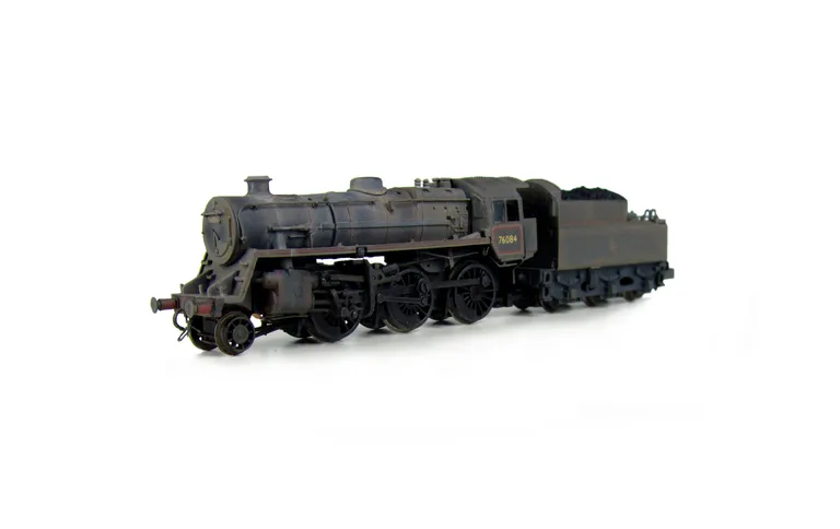 4MT 76084 heavily weathered with tender changed with modified crest and lining. Added details include: renumbered, molded coal replaced with real coal, loco crew added, fire irons, etched depot plaques and work plates, detailed buffer beam at one end and 