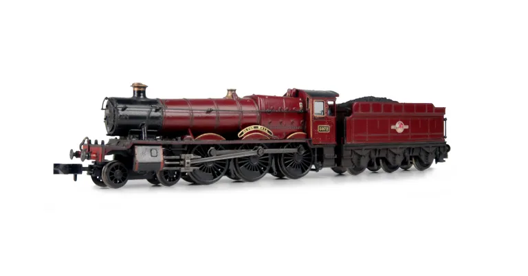 Full respray into EWS crimson livery, renumbered with etched plates and crew fitted.