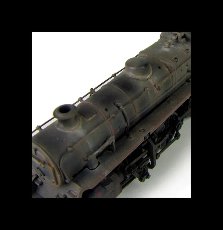 4MT 76084 weathered to represent the last days of steam. Added details include: renumbered, molded coal replaced with real coal, loco crew added, fire irons, etched depot plaques and work plates, detailed buffer beam at one end and painted cab interior.