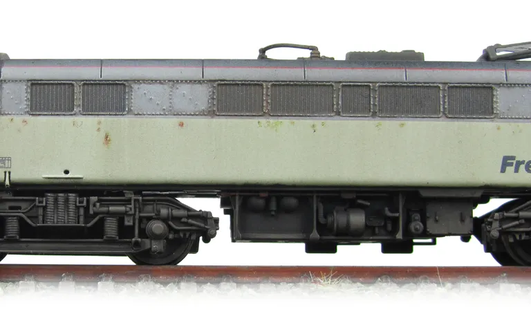 Close up of paint flaking and rust spots.