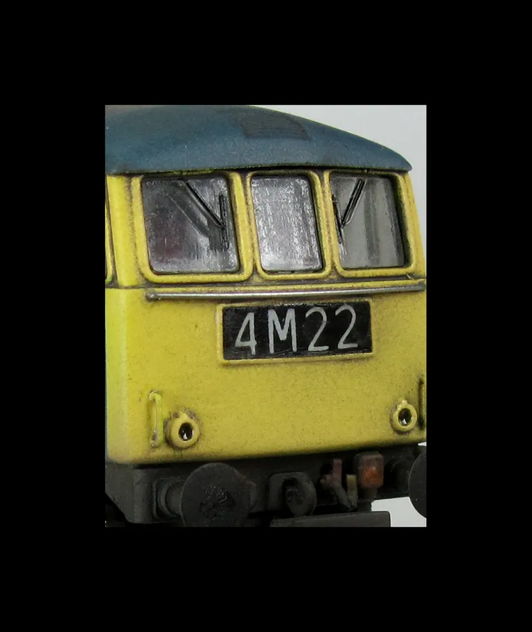 E3173 with a conversion into an earlier type class 86 with full respray into BR blue. Renumbered , front end modified with headcode box conversion, brass buffers, semi detailed buffer beam at both ends, observation pod added to roof, foot tread added, bod