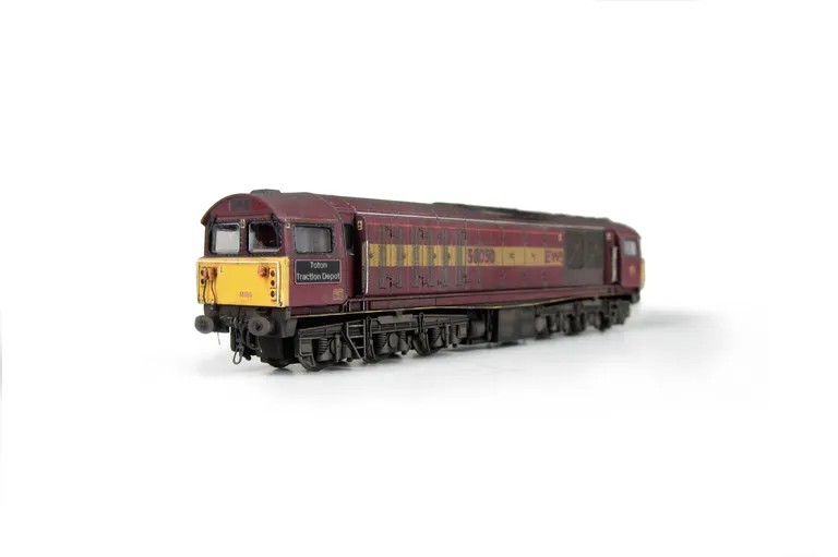 58050 finer nose end handrails with pommels added, etched nameplates, renumbered, driver added, detailed buffer beam at one end and semi detailed at coupler end, small nose end grills and finer mu sockets.