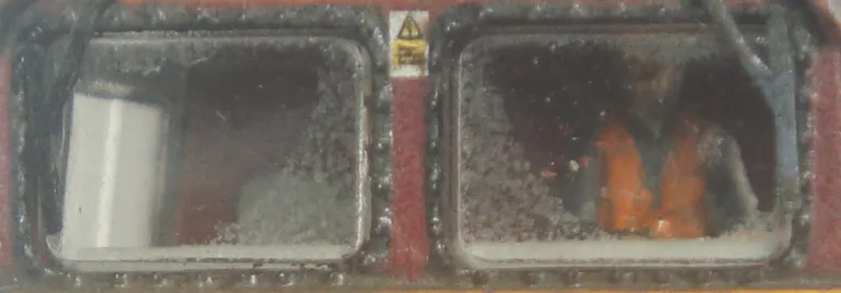 Close up of class 58 with driver fitted in cab