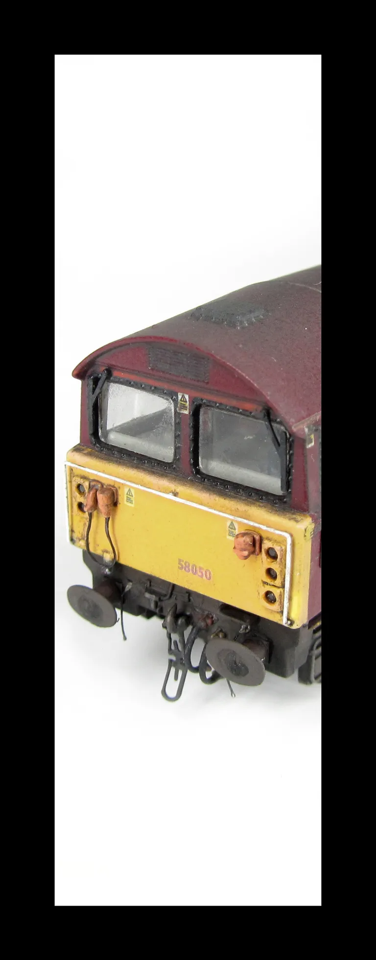 58050 finer nose end handrails with pommels added, etched nameplates, renumbered, driver added, detailed buffer beam at one end and semi detailed at coupler end, small nose end grills and finer mu sockets.