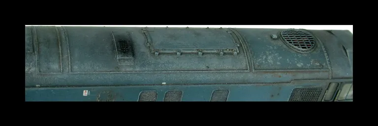 25072 in a dilapidated state close to it's final days with special effects of fading, paint peeling and rust. Other details include: detailed buffer beam at one end and semi detailed at coupler end, battery box modification to create a more 3D version, no