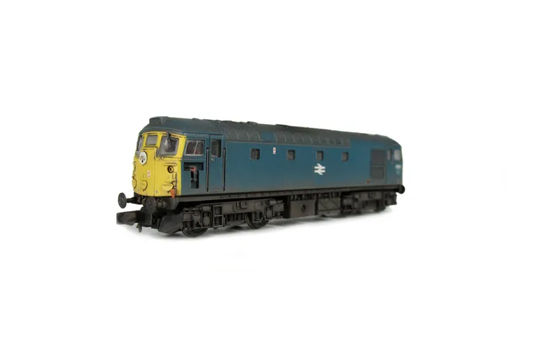 D5338 Full respray to BR Blue and conversion to central seam headcode version, renumbered, token catcher box added, disc catches, brass buffers, snowploughs, no rubber window surrounds, bodyside window frames taken off and made flush and semi detailed buf