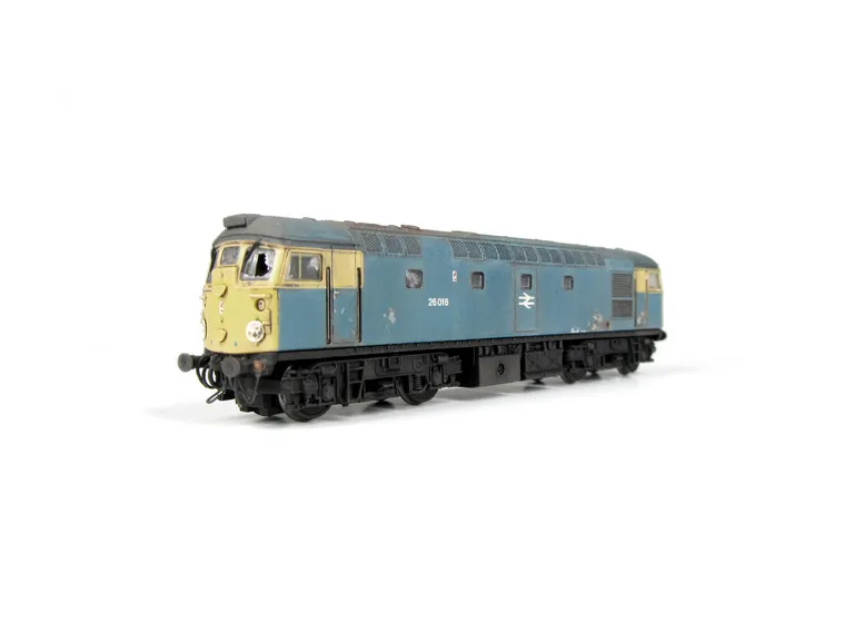 26018 Conversion to disc headcode version representing a loco in it's last days on the scrapline. Full respray into correct faded shades, renumbered, disc catches, special effect of paint peeling and rust patches, broken and boarded over windows, tapered 