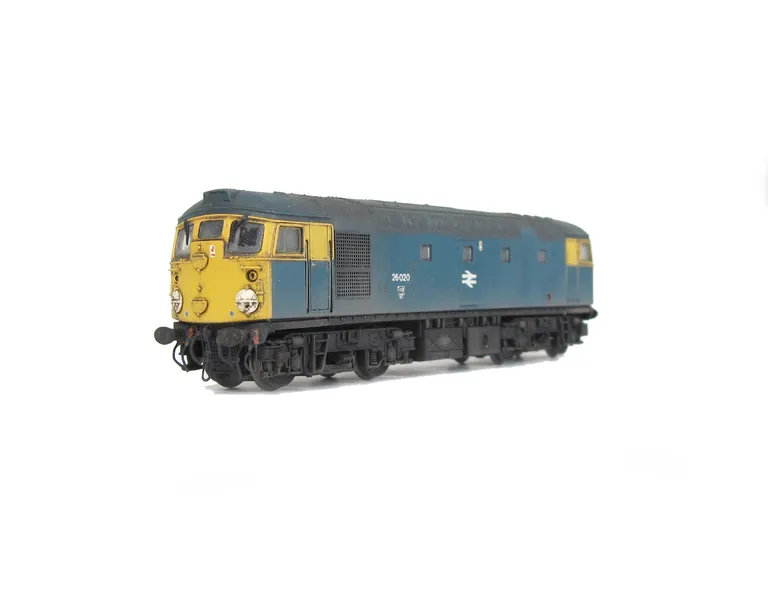 26020 Conversion to disc headcode version, full respray into correct colours, renumbered, disc catches, special effect of paint peeling on doors, tapered steps with leaf spring bogies, brass oval buffers, straight framed side windows, speedo cable, remove