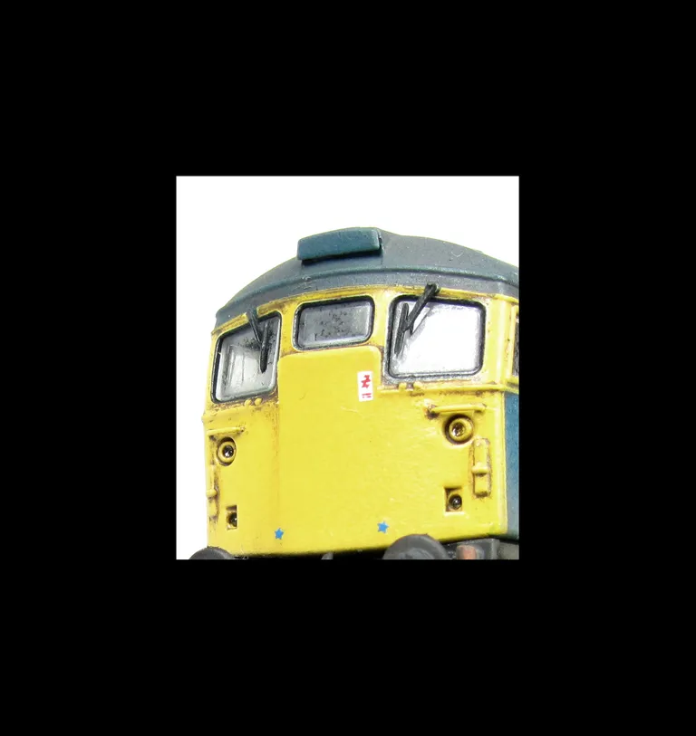 Close up of finer thinned down rubber surrounds to windows and moulded handrails replaced with wire.