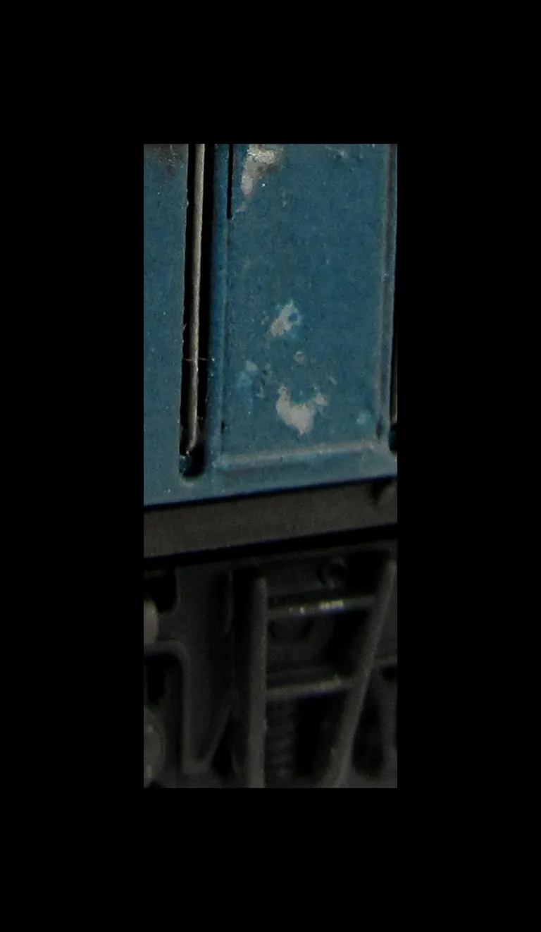 Close up of paint flaking on door which is often seen on a class 26.