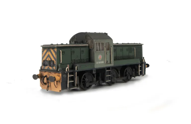 D9506 Renumbered with detailed buffer beam at one end and semi detailed buffer beam including cowling at coupling end. fuel gauge painted black as well as coupling rods, driver fitted, etched Swindon work plates and cab colour lightened to match prototype