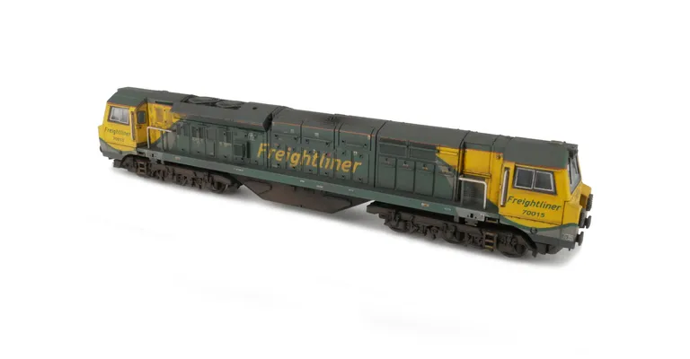 70015 with detailed buffer beam at one end and semi detailed at coupling end, snowploughs mounted on cab, driver fitted and a multitude of extra detail added to the top of the bogie frames and bottom of the running plate.