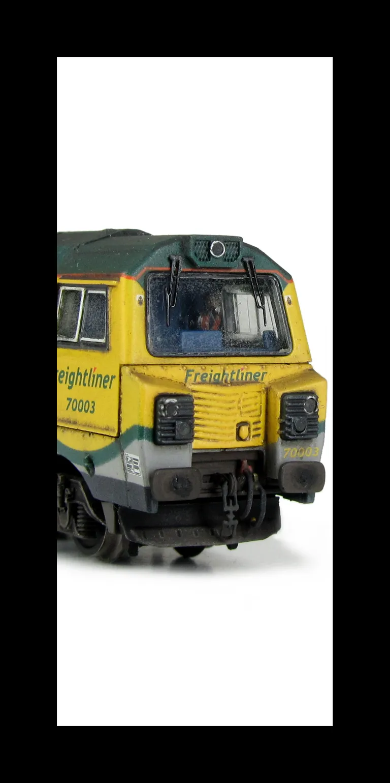 70003 with detailed buffer beam at one end and semi detailed at coupling end, snowploughs mounted on cab, driver fitted, long pipe added to underframe, short pipes to the sandboxes and a multitude of extra detail added to the top of the bogie frames and b