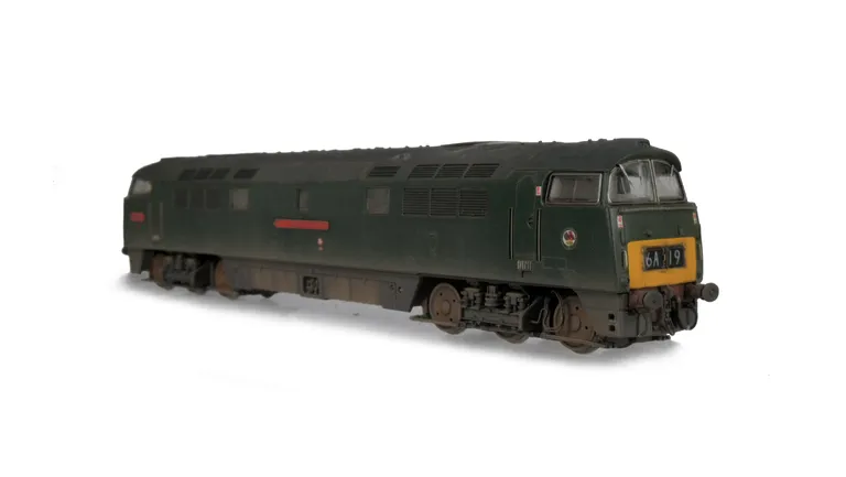 D1003 renumbered, etched nameplates/work plates and running numbers, detailed buffer beam at one end and semi detailed at coupling end, brake rigging added, plastic panels added to headcodes, smaller holes on wheels, nose end moulded handrails and catch r