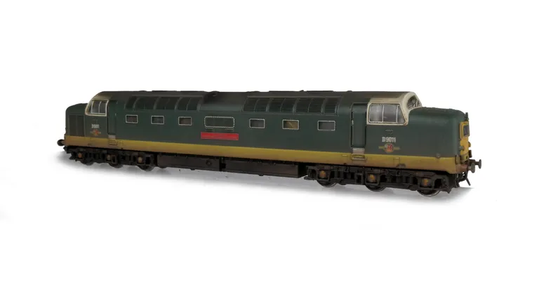 D9011 renumbered. Other details include: etched work plates, finer nose end handrails, driver, detailed buffer beam at one end and semi detailed at coupling end, bogie modification to reduce gap between body and bogies, roof grills replaced with much fine