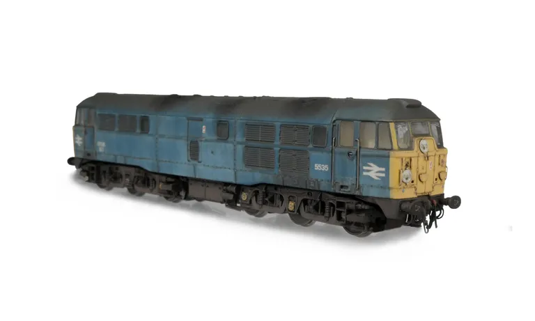 D5535 converted to a disc headcode skinhead version with full respray into dilapidated faded BR Blue. Added details include: detailed buffer beam and semi detailed at coupling end, driver, renumbered, roof grills replaced with much finer and correct etche