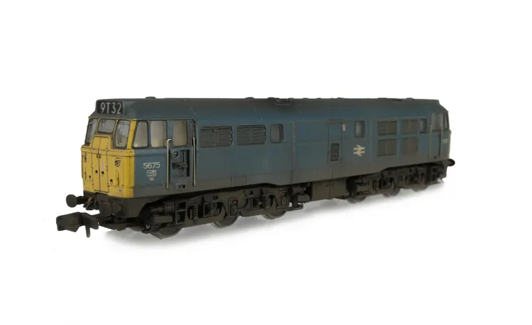 D5675 Full respray to BR Blue, Added details include: door recess including token catcher, semi detailed at both ends, renumbered, headcodes changed, etched work plates, bogie mod to make the gap between body and bogies smaller and roof grills replaced wi