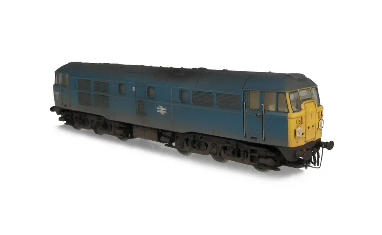 31102 converted to a disc headcode skinhead version with full respray into BR Blue. Added details include: renumbered, bogie modification to close the gap between body and bogies and heavily modified nose end with discs, handrails and catches.