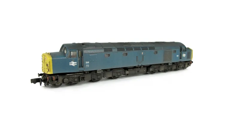 D314 Full respray to BR Blue. Details include: renumbered, handrails on nose, semi detailed buffer beam at both ends, moulded roof grill replaced with 3D etched version, disc catches added, fine headcodes, etched work plates and frost grill