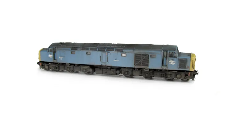 40023 Full respray to BR Blue in extreme faded scrapline condition. Details include: renumbered, handrails on nose, driver, detailed buffer beam, semi detailed buffer beam at coupling end, moulded roof grill replaced with 3D etched version, disc catches a
