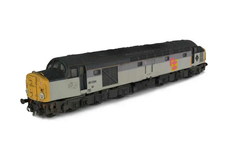 40034 Full respray in to Railfreight fantasy livery. Details include: renumbered, handrails on nose, driver, detailed buffer beam, semi detailed buffer beam at coupling end, moulded roof grill replaced with 3D etched version, disc catches added, fine head