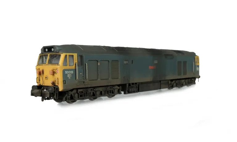 50013  Added details include: etched work plates, headcode box modified to more prototypical version,  painted cab interior, driver, etched nameplates, speedo cable added, BR arrows moved to correct positions, mu socket replaced and moulded roof grills re